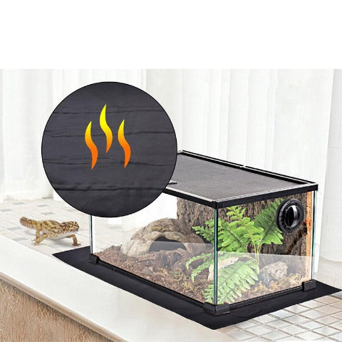 A Reptile Heating Mat under a terrarium