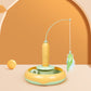 An orange-green Teaser Wand for Cats on orange background