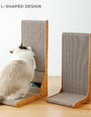 A cat scratching its claws on a Vertical Cat Scratch Pad, next to another to another L-shaped one